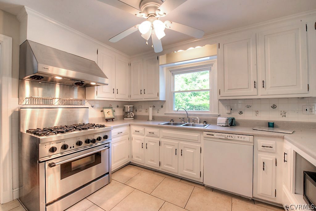 7720 Varann Road Henrico, VA 23231 - Photo 24 of 39 a kitchen with cabinets appliances and a window