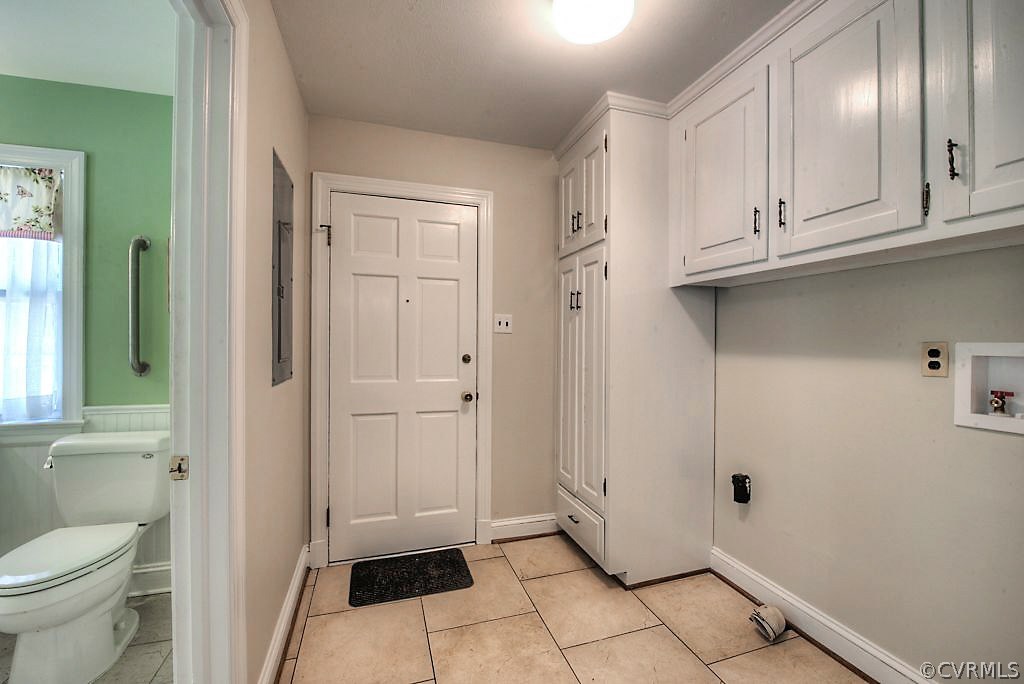 7720 Varann Road Henrico, VA 23231 - Photo 26 of 39 a bathroom with white cabinets