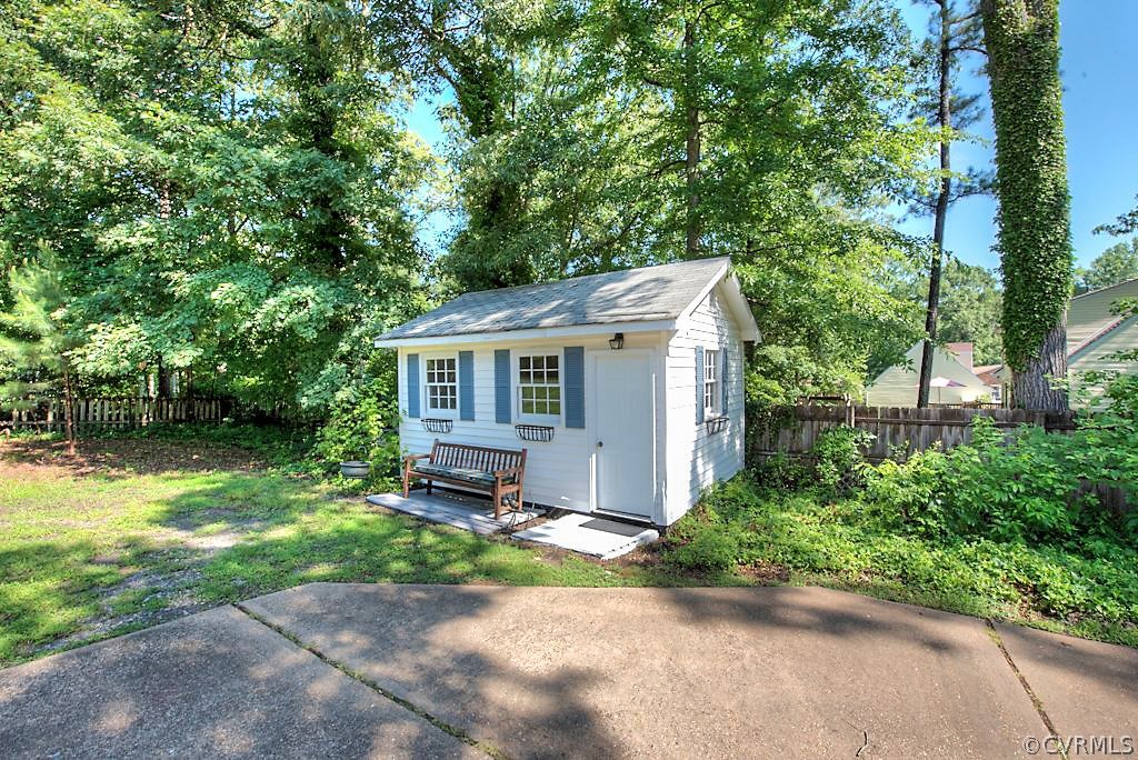 7720 Varann Road Henrico, VA 23231 - Photo 5 of 39 a view of a house with backyard and garden
