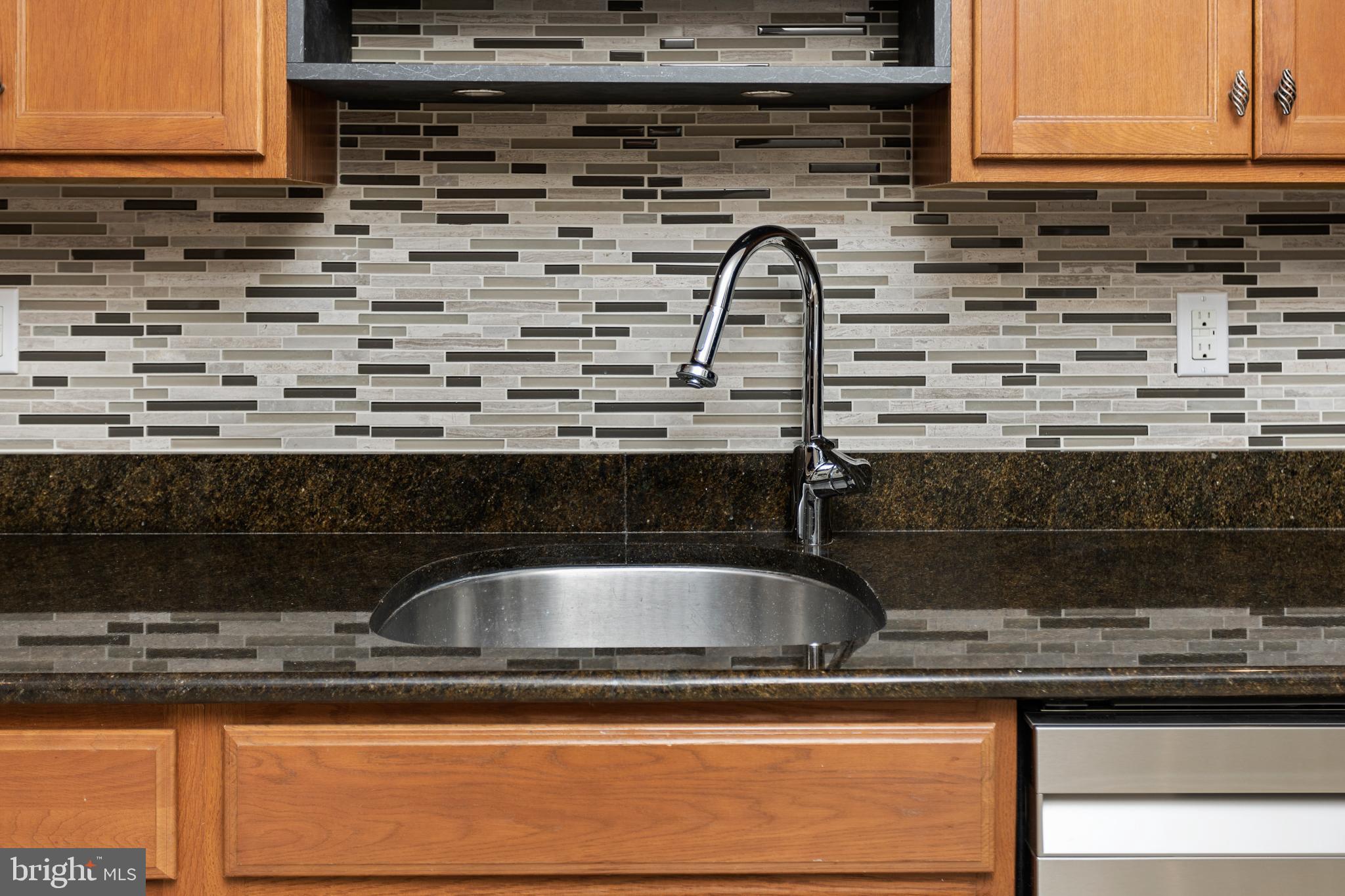 6 Flagger Lane Hamilton, NJ 08619 - Photo 14 of 32 a close view of sink and granite counter