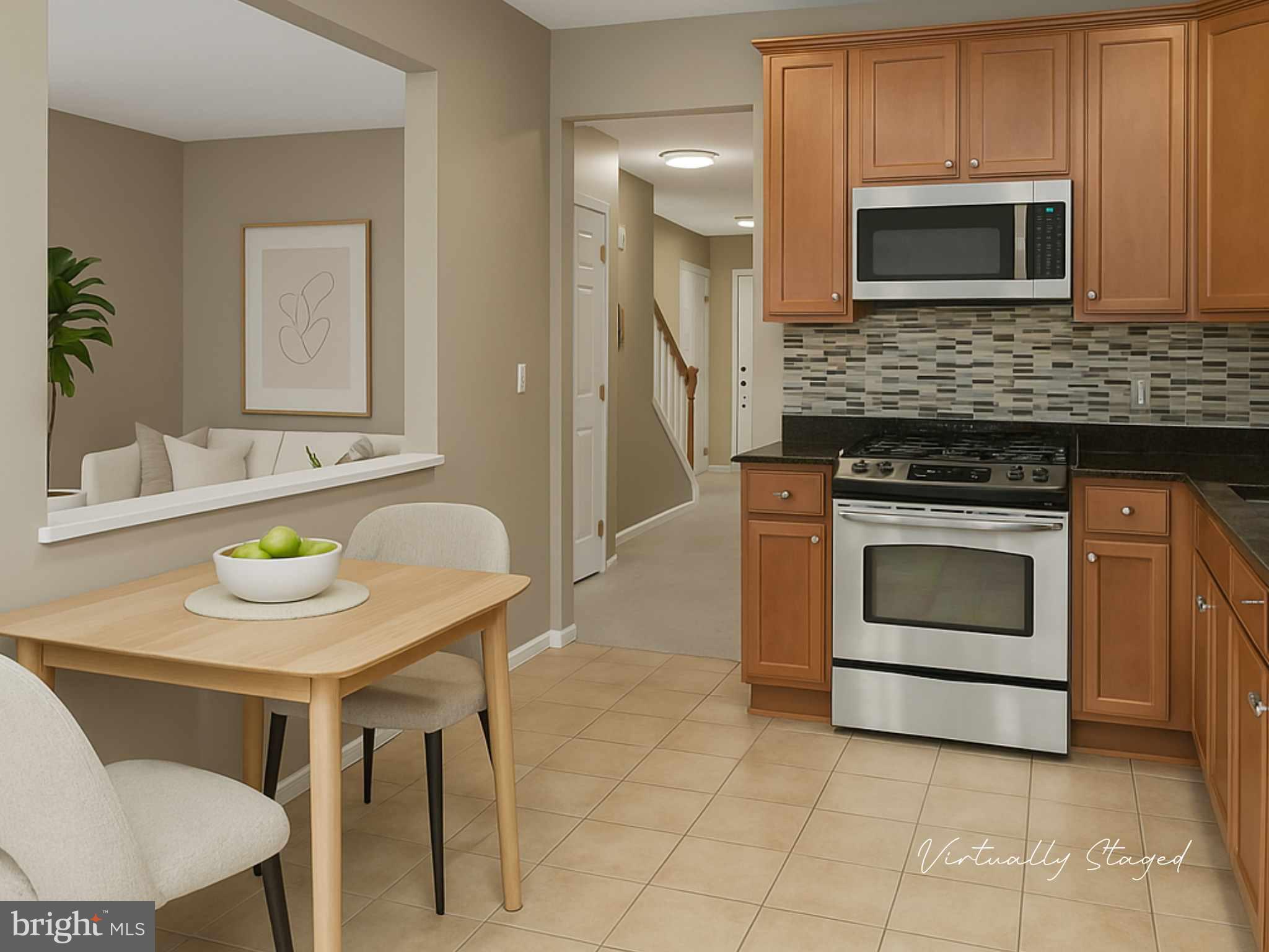 6 Flagger Lane Hamilton, NJ 08619 - Photo 16 of 32 a kitchen with a stove a microwave a sink and white cabinets