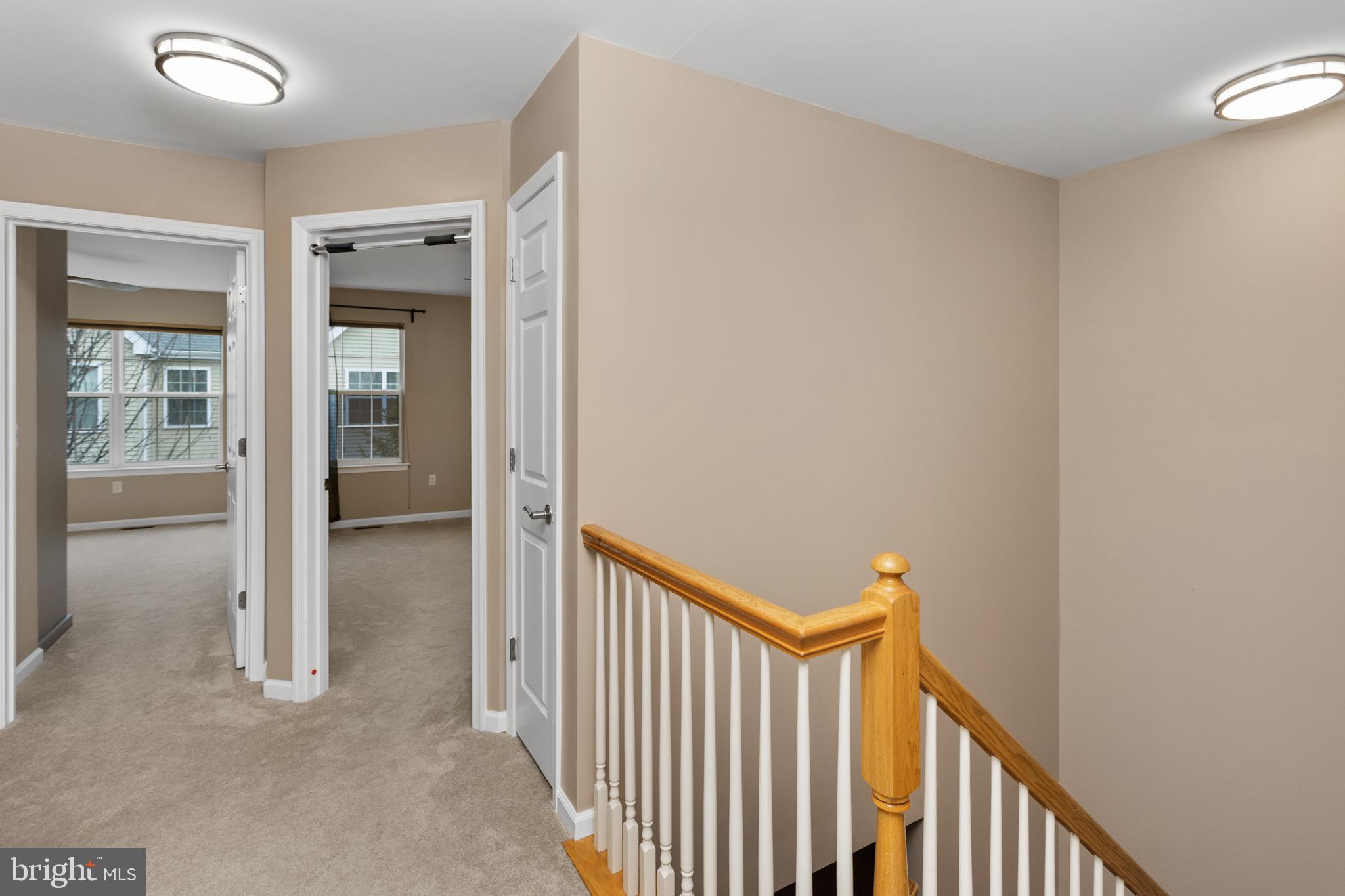 6 Flagger Lane Hamilton, NJ 08619 - Photo 17 of 32 a view of a hallway with wooden floor and entryway