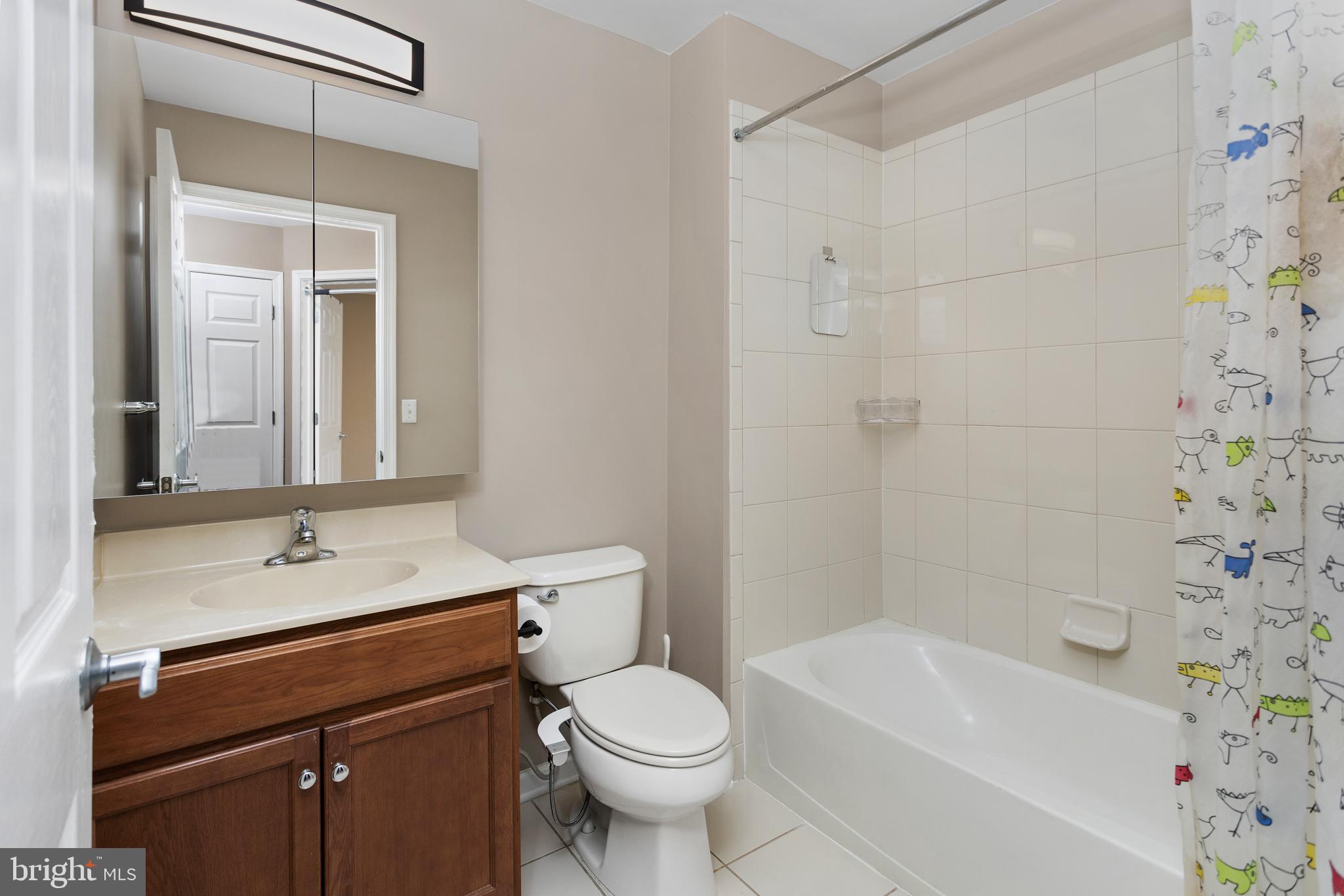 6 Flagger Lane Hamilton, NJ 08619 - Photo 23 of 32 a bathroom with a sink toilet and shower