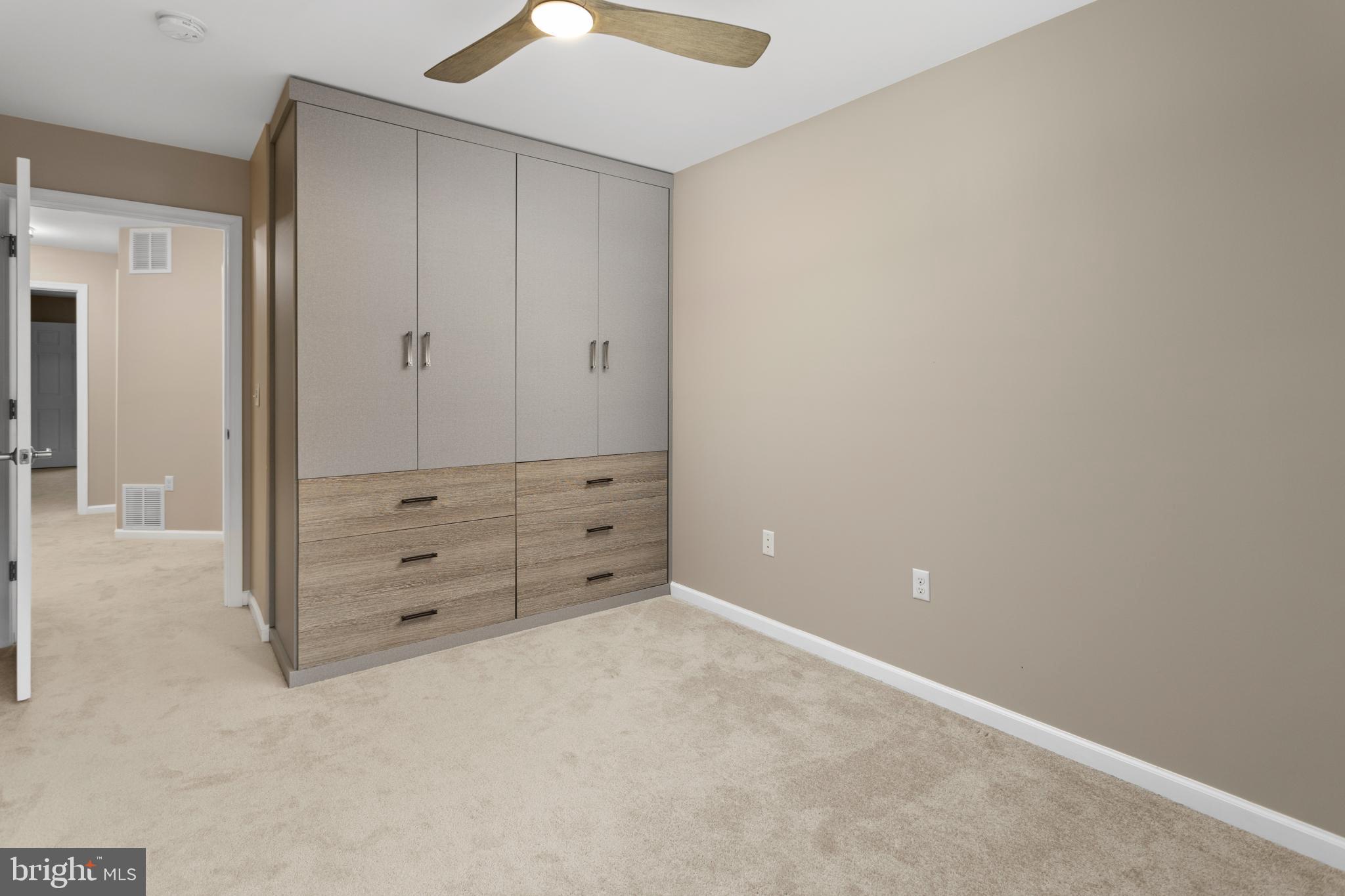 6 Flagger Lane Hamilton, NJ 08619 - Photo 25 of 32 wooden floor and cabinet in a room