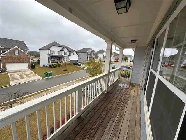 a view of a balcony with city view