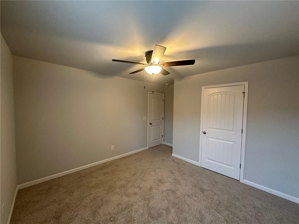 623 Little Bear Loop Canton, GA 30114 - Photo 16 of 24 a view of an empty room