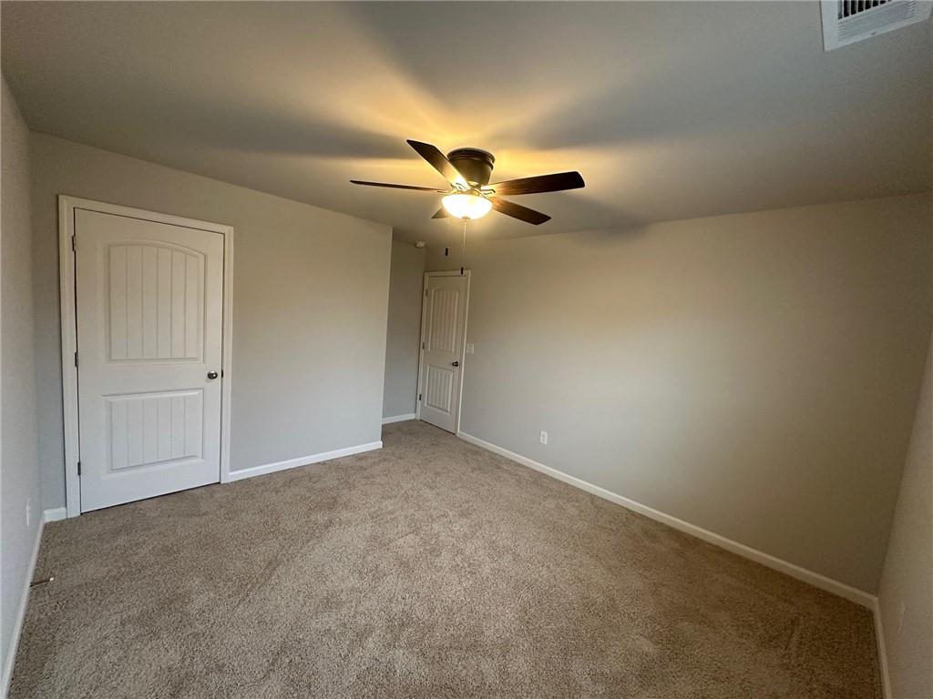 623 Little Bear Loop Canton, GA 30114 - Photo 21 of 24 a view of an empty room