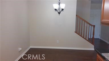 1510 Orange Avenue, Unit 205 Redlands, CA 92373 - Photo 7 of 27 a view of a hallway with wooden floor