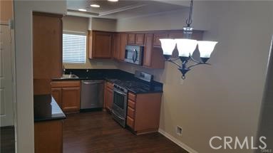 1510 Orange Avenue, Unit 205 Redlands, CA 92373 - Photo 8 of 27 a kitchen with stainless steel appliances granite countertop a stove and a sink