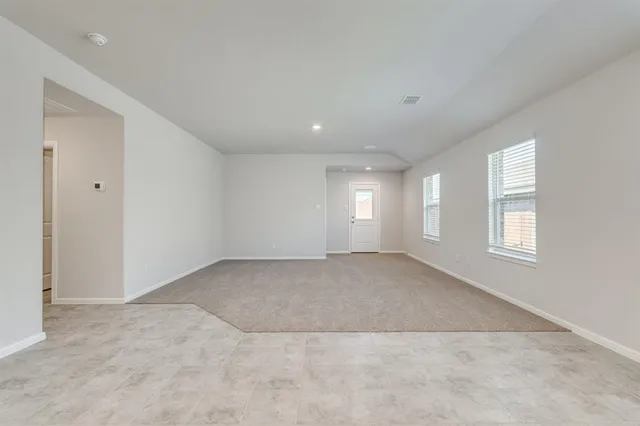 an empty room with a natural light