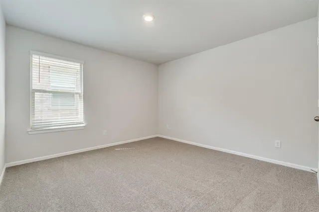 a front view of a house with yard