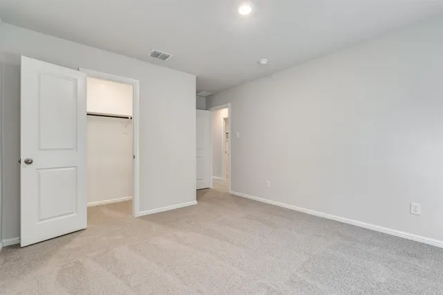 a front view of house with yard and patio