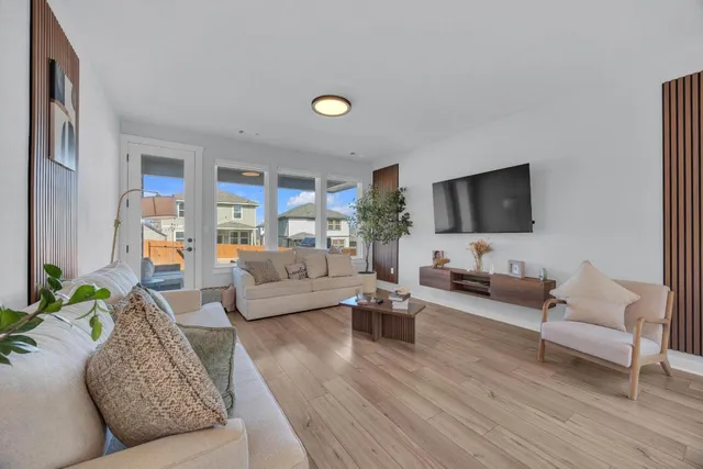 a kitchen with stainless steel appliances a sink stove and cabinets
