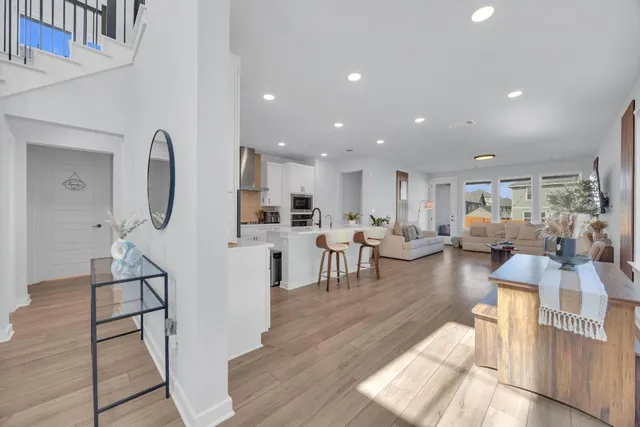 a view of a house with a yard and sitting area