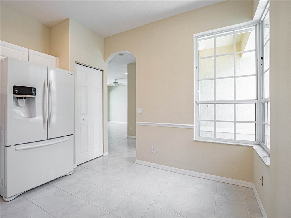 1422 Tradewinds Way Sebastian, FL 32958 - Photo 11 of 35 a view of an empty room with a window