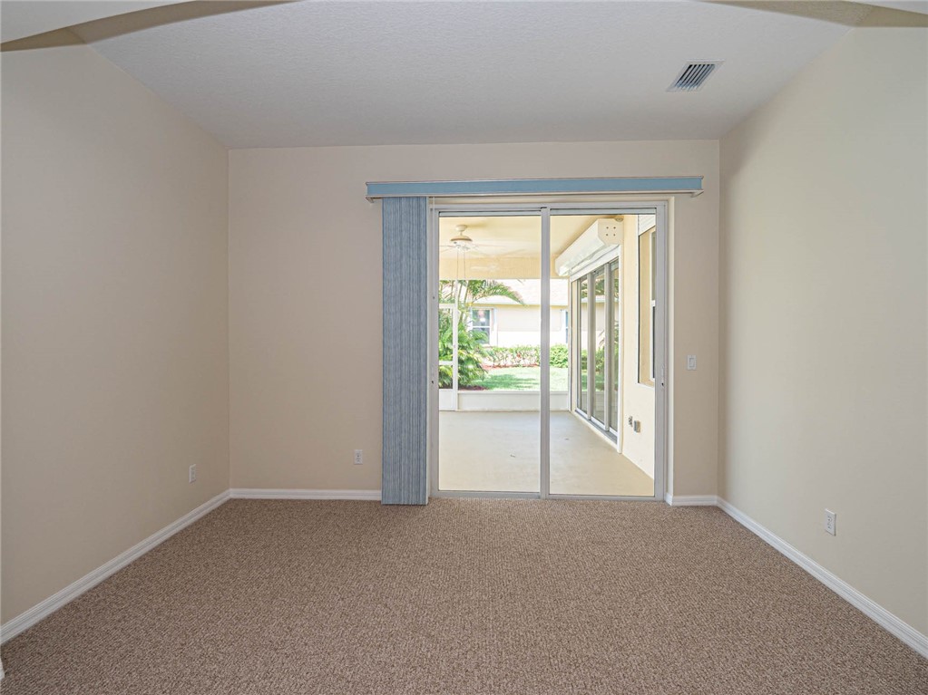 1422 Tradewinds Way Sebastian, FL 32958 - Photo 16 of 35 a view of an empty room and a window