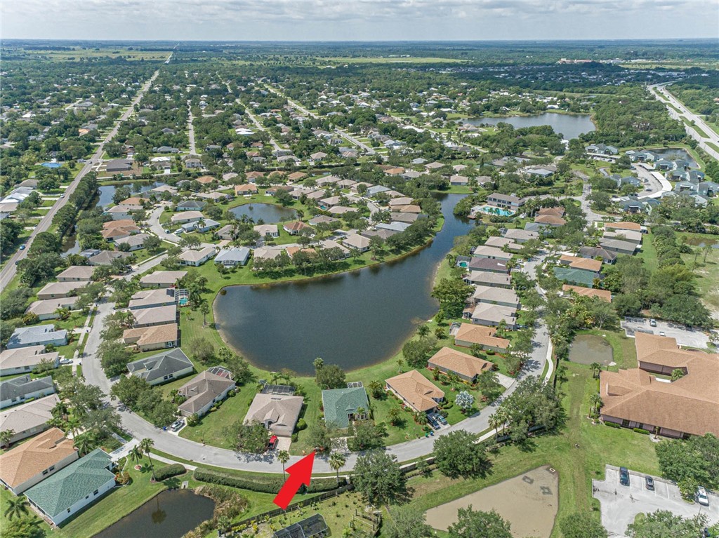 1422 Tradewinds Way Sebastian, FL 32958 - Photo 31 of 35 an aerial view of residential houses with outdoor space