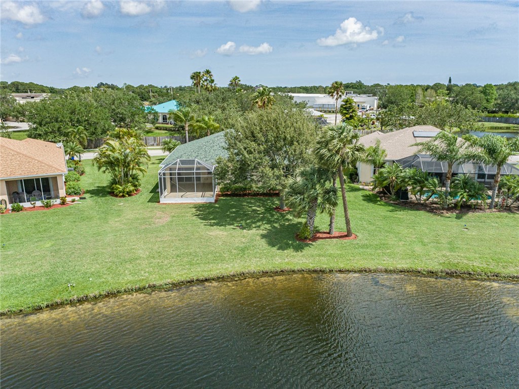 1422 Tradewinds Way Sebastian, FL 32958 - Photo 34 of 35 a view of a lake with houses