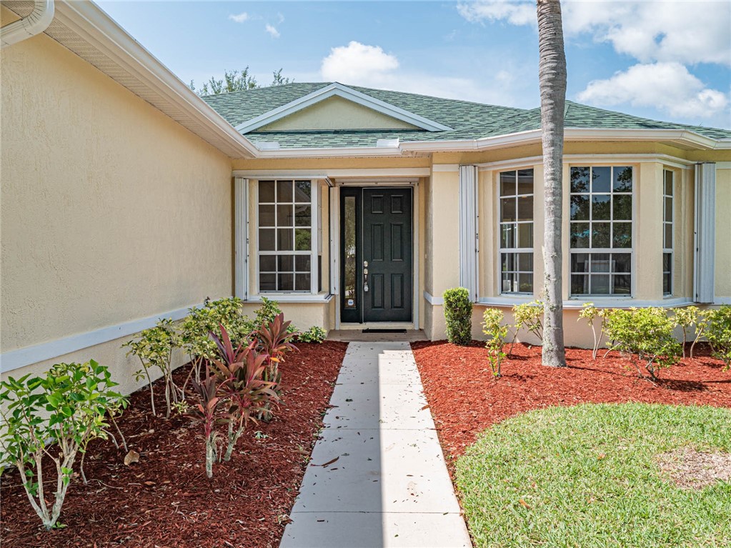 1422 Tradewinds Way Sebastian, FL 32958 - Photo 5 of 35 front view of a house
