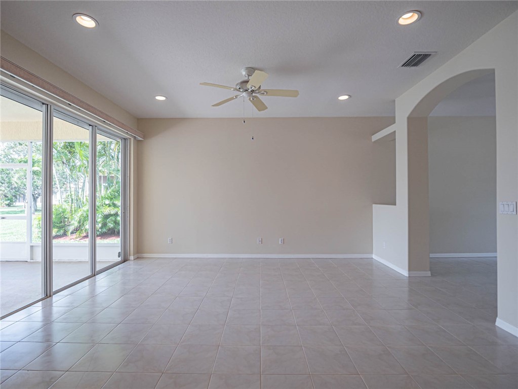 1422 Tradewinds Way Sebastian, FL 32958 - Photo 7 of 35 a view of an empty room with a window