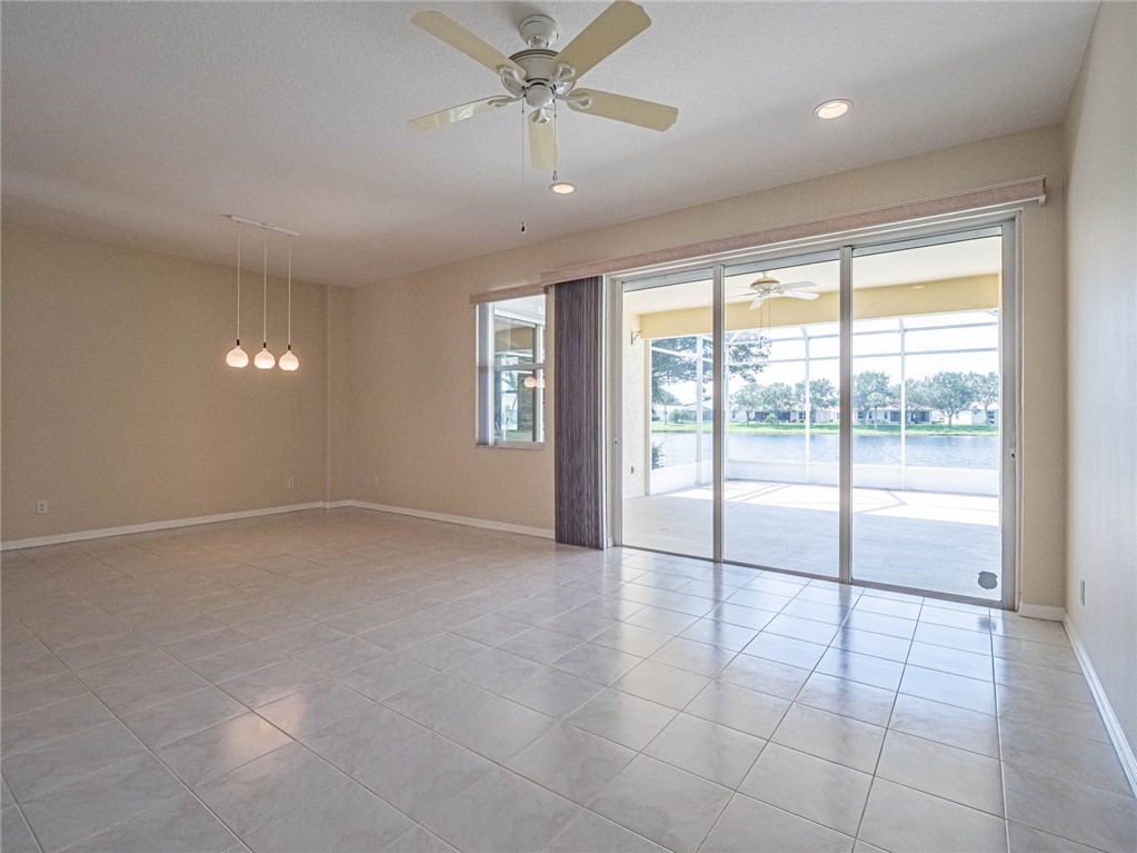 1422 Tradewinds Way Sebastian, FL 32958 - Photo 8 of 35 a view of an empty room with a window
