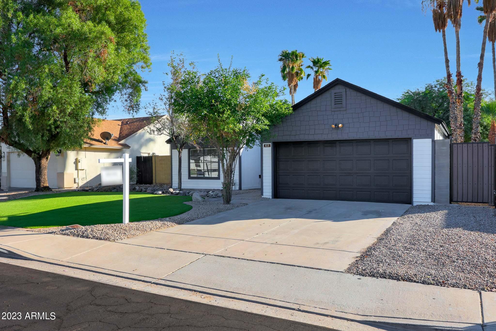 613 West Rosemonte Drive Phoenix, AZ 85027 - Photo 1 of 24 a house view with a garden space