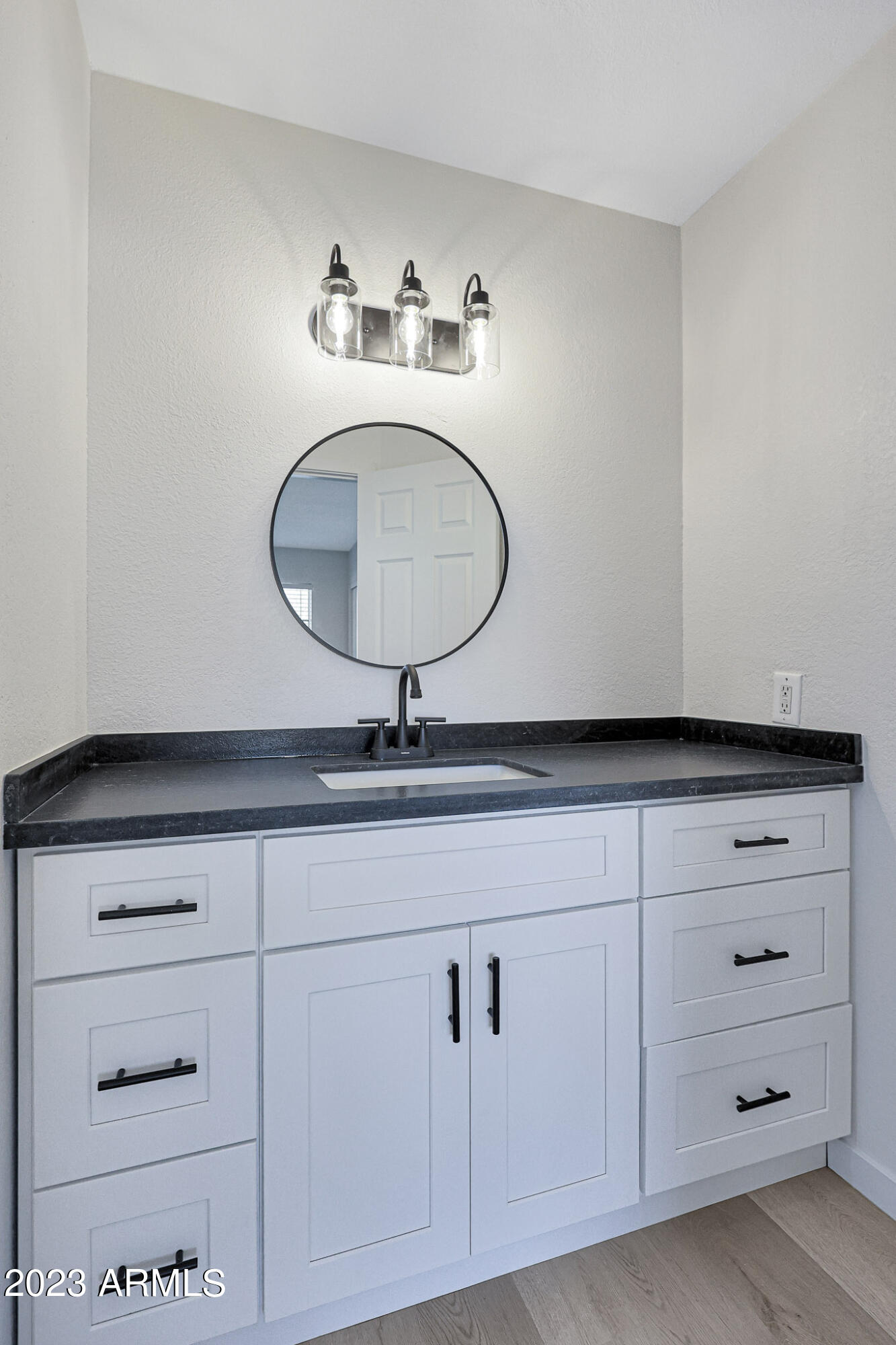 613 West Rosemonte Drive Phoenix, AZ 85027 - Photo 13 of 24 a bathroom with a sink and a mirror