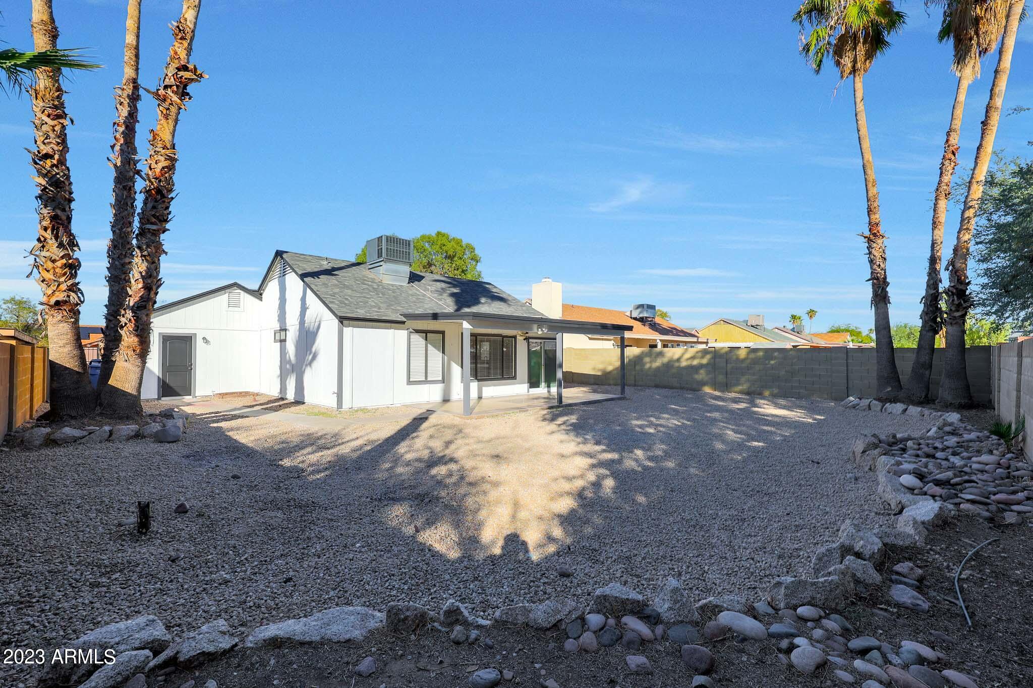 613 West Rosemonte Drive Phoenix, AZ 85027 - Photo 24 of 24 a view of a house with a yard
