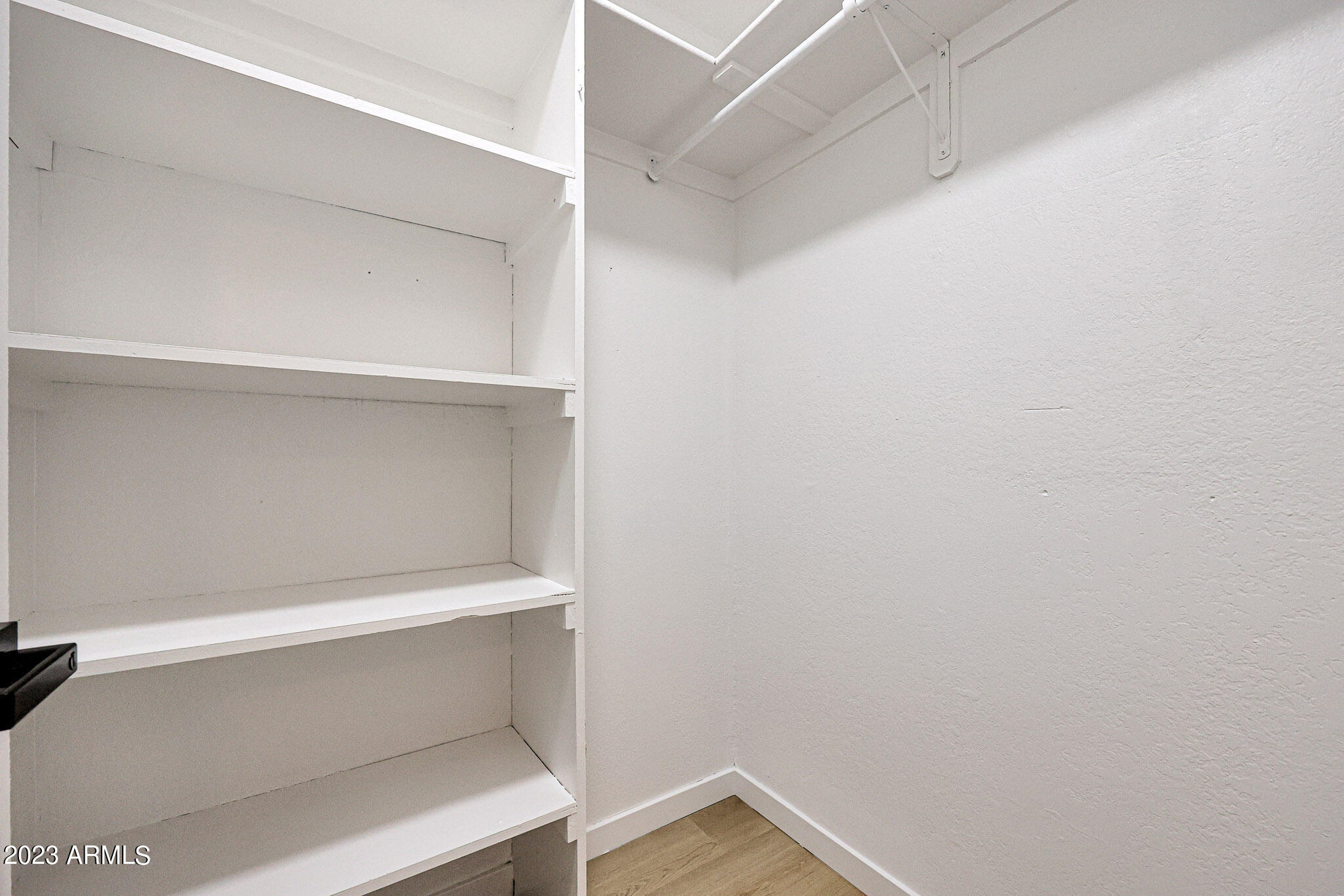 613 West Rosemonte Drive Phoenix, AZ 85027 - Photo 6 of 24 a view of an empty walk in closet