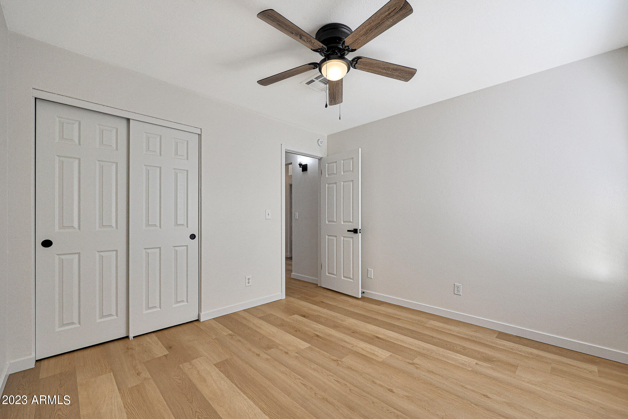 613 West Rosemonte Drive Phoenix, AZ 85027 - Photo 9 of 24 a view of an empty room with a window