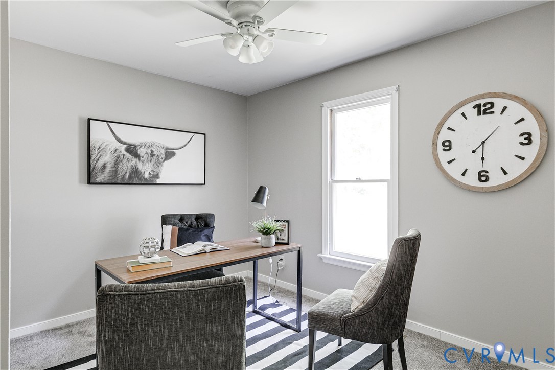 11211 Moravia Road Midlothian, VA 23112 - Photo 21 of 40 a view of a workspace with furniture and a window