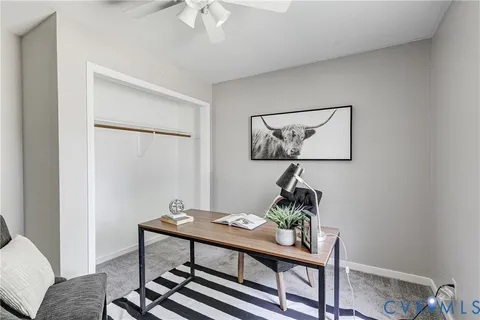 a view of a livingroom with furniture