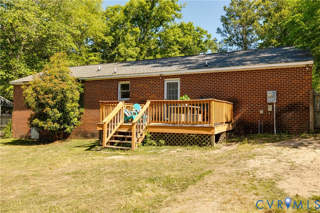 11211 Moravia Road Midlothian, VA 23112 - Photo 40 of 40 a view of a chairs and table in the back yard