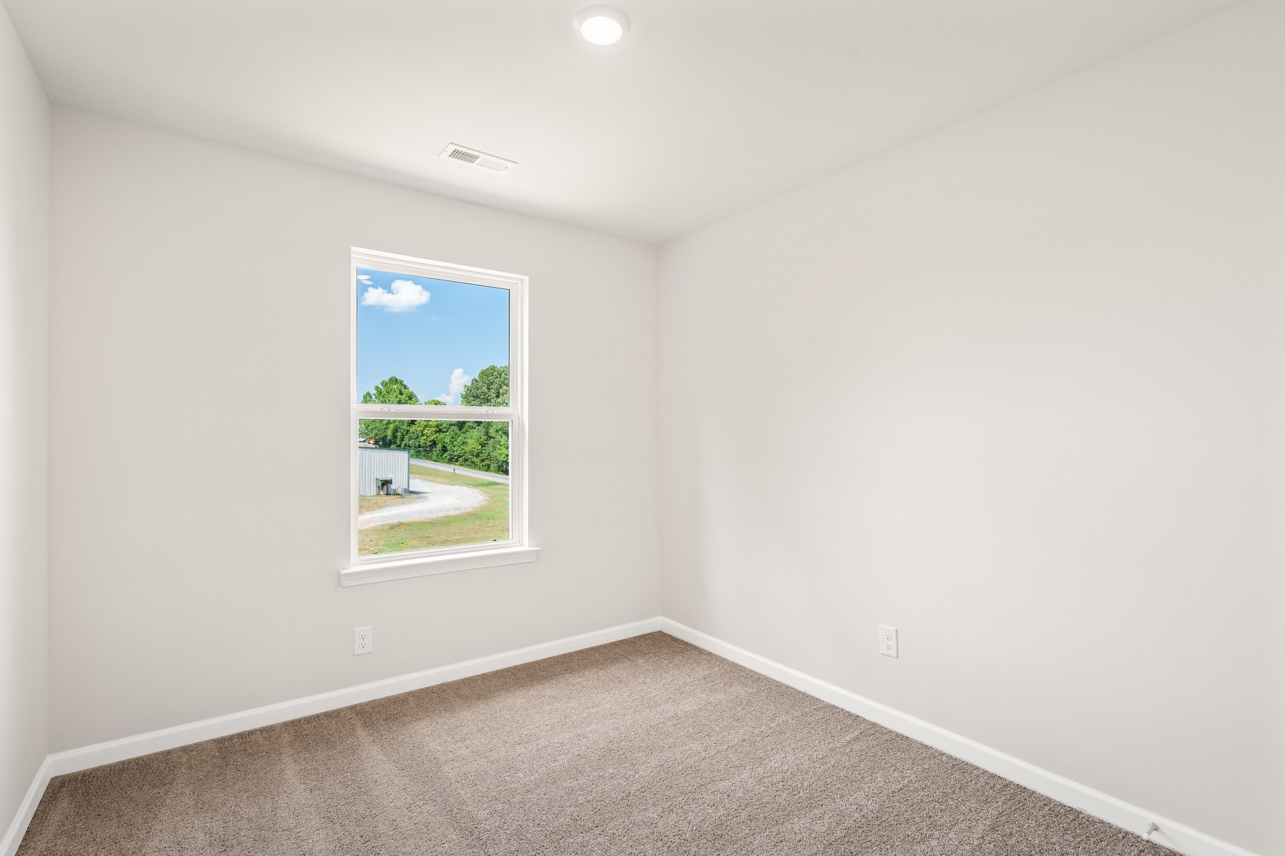 2012 Lala Loop White Bluff, TN 37187 - Photo 11 of 13 an empty room with windows
