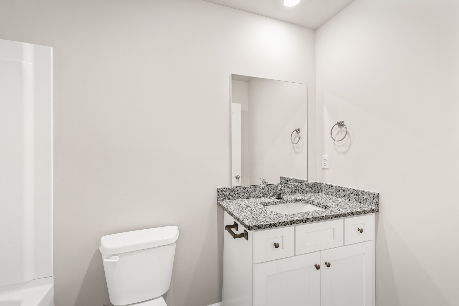2012 Lala Loop White Bluff, TN 37187 - Photo 13 of 13 a bathroom with a granite countertop sink and a toilet