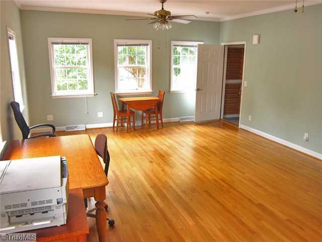 6330 Rustinburg Road Clemmons, NC 27012 - Photo 13 of 16 Bonus. Huge bonus room in the back of house features a half bath, 12 feet of closet space, and a separate climate control system.