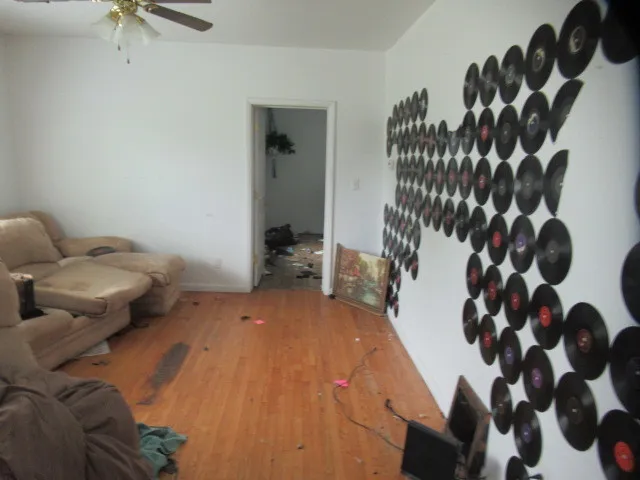 a living room with furniture and a rug