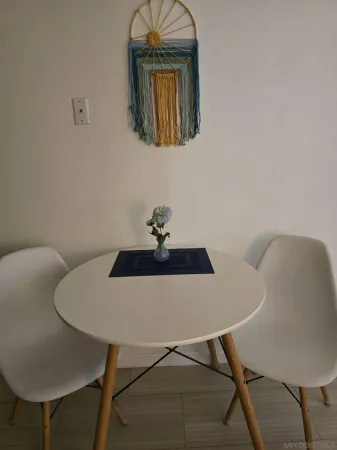 a view of a workspace with furniture