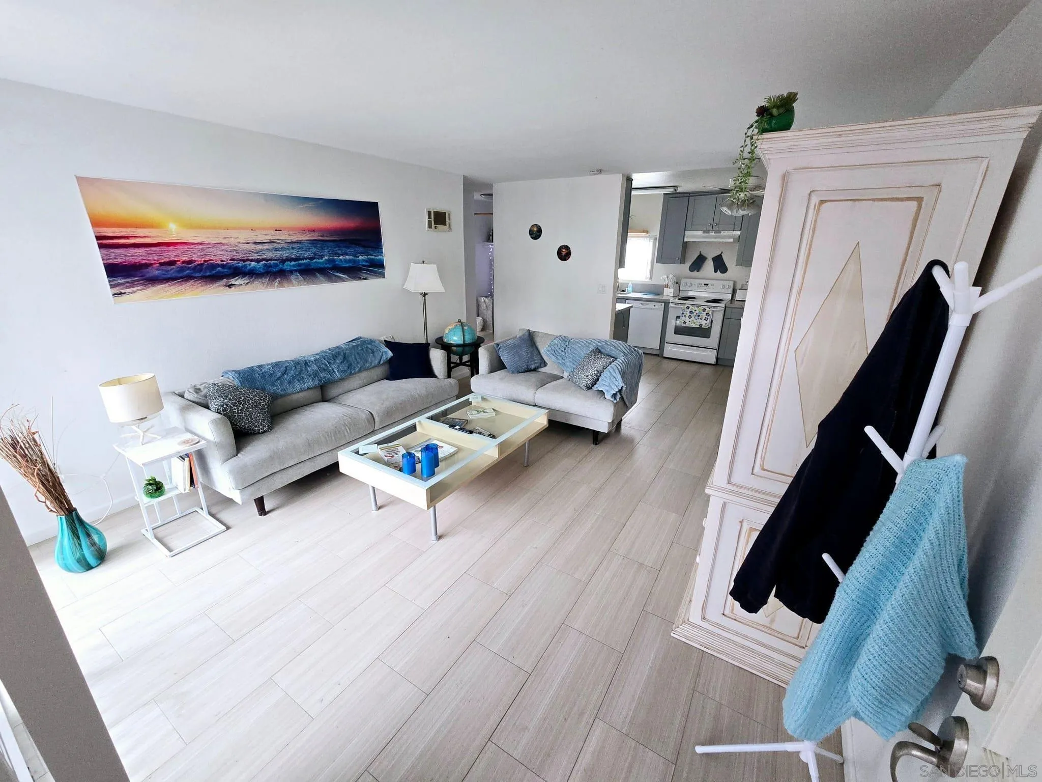 6333 Mt Ada Road, Unit 168 San Diego, CA 92111 - Photo 10 of 23 a living room with furniture and a couch