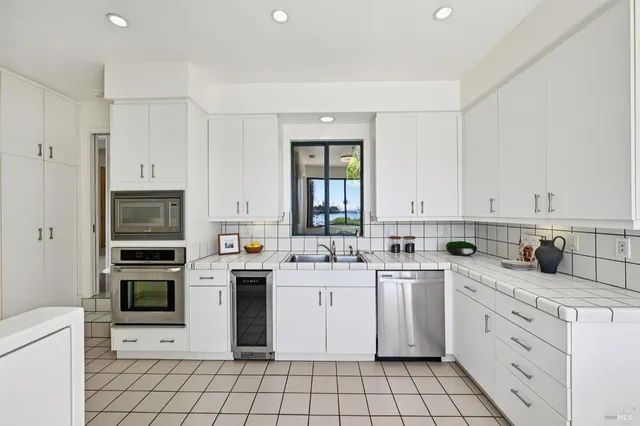 a view of a living room and a balcony