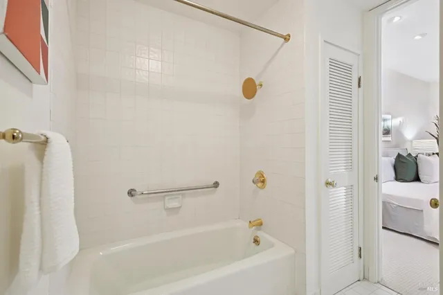 a view of a swimming pool with a lounge chairs