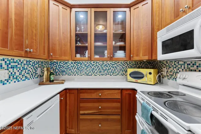 a view of a house with a back yard