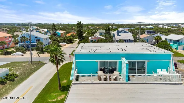 a view of two chairs in balcony