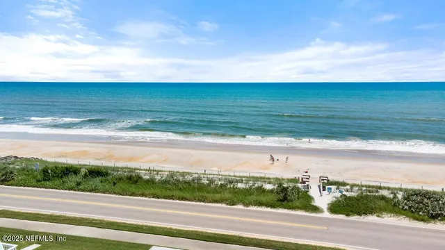 a view of balcony with furniture