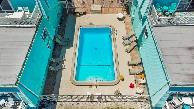 a view of a hallway with stairs