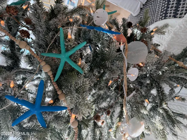 a view of a house with a swimming pool and a yard