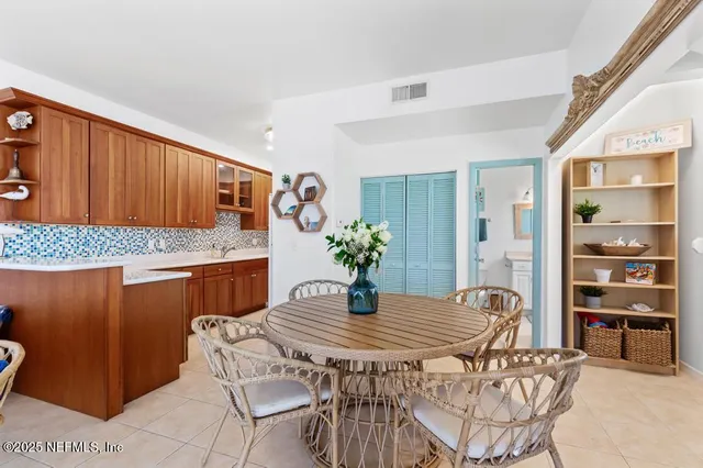 a swimming pool with outdoor seating yard and outdoor seating