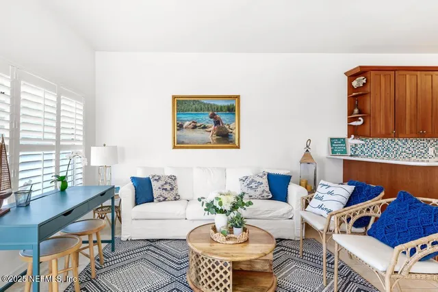 a view of a house with a swimming pool and a yard