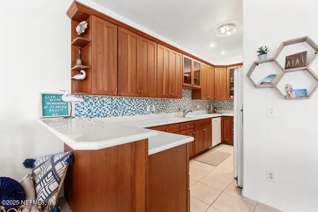 $420,000 | 2682 South Ocean Shore Boulevard, Unit 202, Flagler Beach, FL 32136