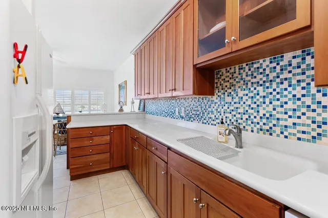 a view of a house with roof deck front of house